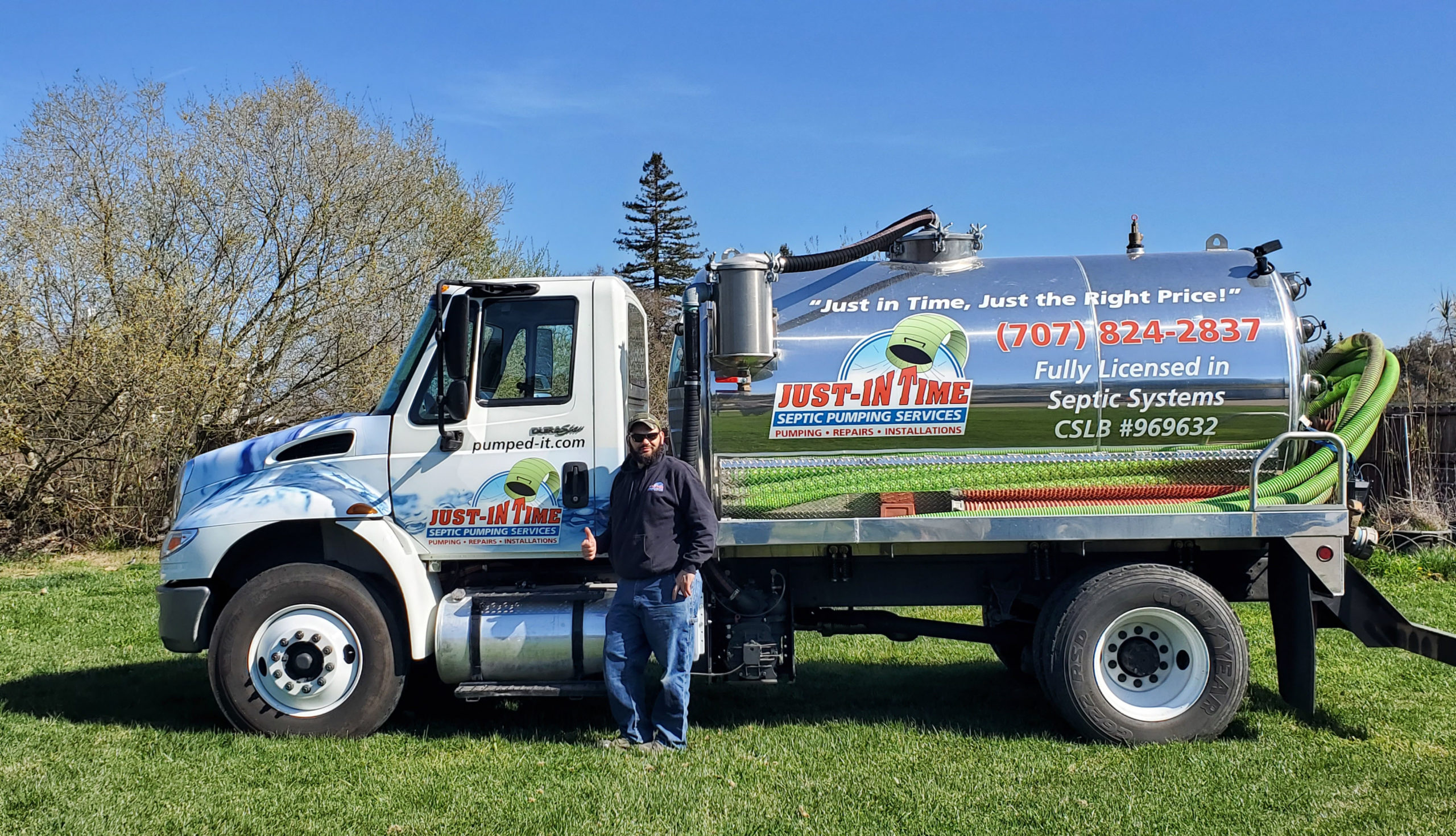 Justin standing in front of a Just-in Time Septic pump truck